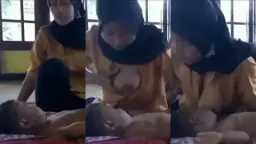 Suster Berjilbab Menggairahkan Saat Menyusui Buah Hati